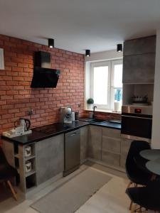 Kuchnia lub aneks kuchenny w obiekcie Apartament Port