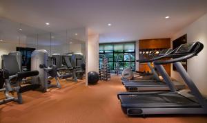 a gym with treadmills and ellipticals and mirrors at Angsana Bintan in Lagoi
