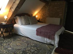 Postel nebo postele na pokoji v ubytování Pérard Chambres D’Hotes