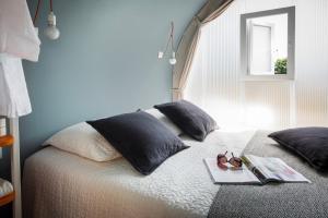 Un pat sau paturi într-o cameră la International Glamping Lago Di Bracciano