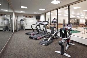 a gym with several treadmills and elliptical machines at Holiday Inn Express & Suites Zanesville North by IHG in Zanesville
