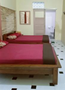 Letto o letti in una camera di ADA Homestay