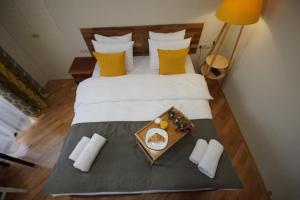 Postelja oz. postelje v sobi nastanitve Hotel Cordata