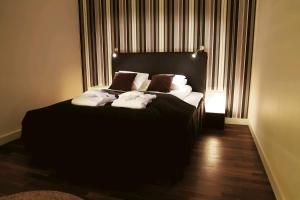 Letto o letti in una camera di First Hotel Witt