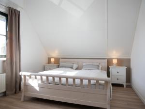 Ένα ή περισσότερα κρεβάτια σε δωμάτιο στο Villa Buiten 41