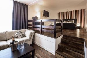 Postel nebo postele na pokoji v ubytování First Hotel Witt