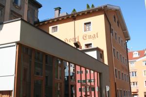 a building with a sign on the front of it at Hotel Engl in Innsbruck