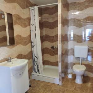Kúpeľňa v ubytovaní Guest House Šapina