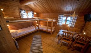 an overhead view of a cabin with two bunk beds at Ulvö Lakeside Resort in Ulvöhamn