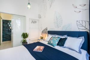 Posteľ alebo postele v izbe v ubytovaní BpR KYANIT Design Apartments with A/C