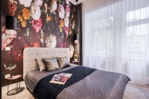 Posteľ alebo postele v izbe v ubytovaní BpR KYANIT Design Apartments with A/C