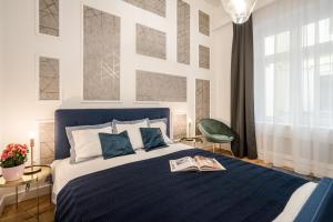 Posteľ alebo postele v izbe v ubytovaní BpR KYANIT Design Apartments with A/C