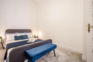 Posteľ alebo postele v izbe v ubytovaní BpR KYANIT Design Apartments with A/C