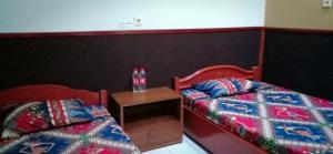 Letto o letti in una camera di ADA Homestay