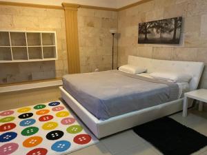 Postel nebo postele na pokoji v ubytování Apartahotel Guaraguao