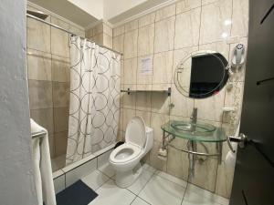 Koupelna v ubytování Apartahotel Guaraguao