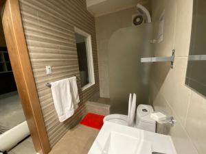 Koupelna v ubytování Apartahotel Guaraguao