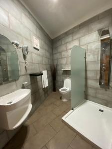 Koupelna v ubytování Apartahotel Guaraguao