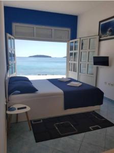 Posteľ alebo postele v izbe v ubytovaní Žal Beach Apartments
