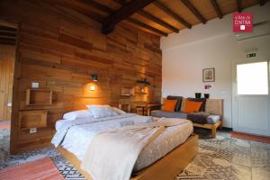 Ένα ή περισσότερα κρεβάτια σε δωμάτιο στο Villas de Cintra