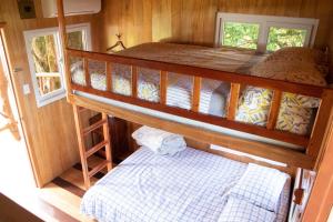 Voodi või voodid majutusasutuse Hilamito Lodge toas