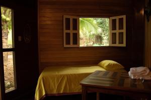 Voodi või voodid majutusasutuse Hilamito Lodge toas