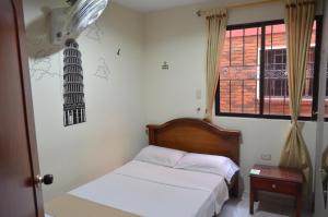 Giường trong phòng chung tại Hotel Balcon Llanero