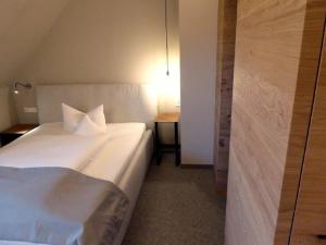 Postel nebo postele na pokoji v ubytování Berghotel Sammüller