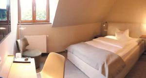 Postel nebo postele na pokoji v ubytování Berghotel Sammüller