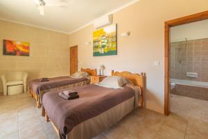 Postel nebo postele na pokoji v ubytování Rebekah Holiday Home