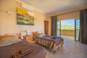 Postel nebo postele na pokoji v ubytování Rebekah Holiday Home