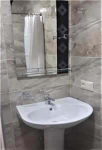 Koupelna v ubytování Hotel Ramaz Paliani + 30 fotografií