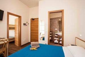 Postel nebo postele na pokoji v ubytování Hotel Sayonara