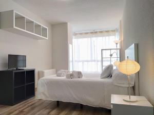 Cama o camas de una habitación en Apartamentos Centro Norte