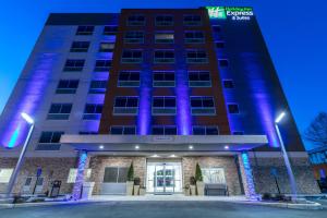 a rendering of the front of the hotel at night at Holiday Inn Express & Suites Jersey City North - Hoboken, an IHG Hotel in Jersey City