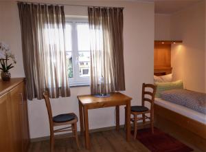 Postel nebo postele na pokoji v ubytování Alpenflair Ferienwohnungen Whg 301