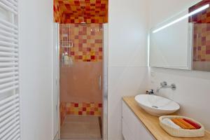 a bathroom with a sink and a shower at Ons Nest in Amsterdam
