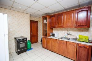 Kuchyň nebo kuchyňský kout v ubytování Residence Le Carat