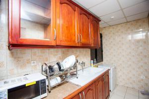 Kuchyň nebo kuchyňský kout v ubytování Residence Le Carat