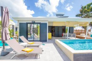 Bazén v ubytování Iguane House Villas & Micro Spa nebo v jeho okolí
