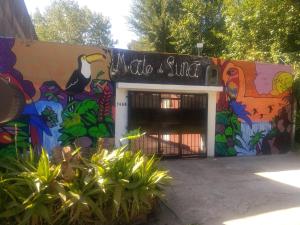 a building with a colorful mural on the side of it at Mate de luna in Buenos Aires