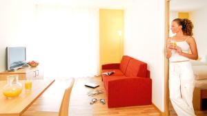 TV a/nebo společenská místnost v ubytování Hotel Residence NATURNSERHOF