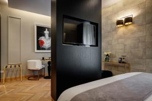 Cama ou camas em um quarto em Dharma Boutique Hotel & SPA