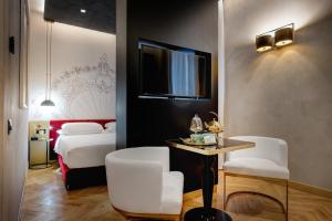 Uma área de estar em Dharma Boutique Hotel & SPA