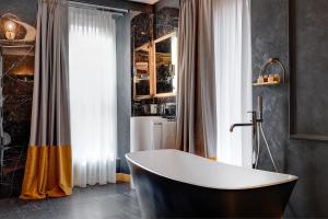 Um banheiro em Dharma Boutique Hotel & SPA