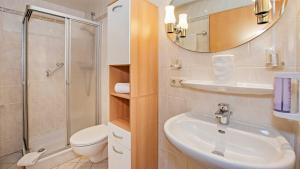 Koupelna v ubytování Hotel Garni Nussbaumhof + 37 fotografií