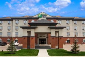 a rendering of a hotel with a building at Holiday Inn Express & Suites Whitecourt, an IHG Hotel in Whitecourt
