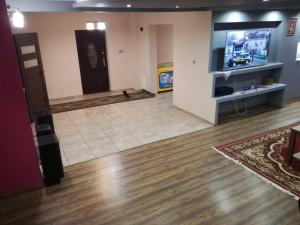 A television and/or entertainment center at Apartament u Wioli