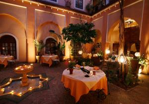 A restaurant or other place to eat at Riad Amina