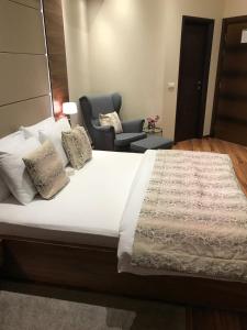 Krevet ili kreveti u jedinici u okviru objekta NV Luxury Suites & Spa